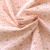 Tissu en coton imprime losanges rose pale